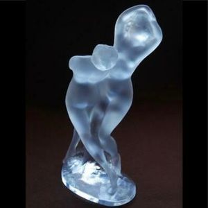 Lalique sculpture of two entwined nude dancers.